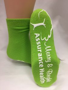 Assurance Health. Lime Green with white